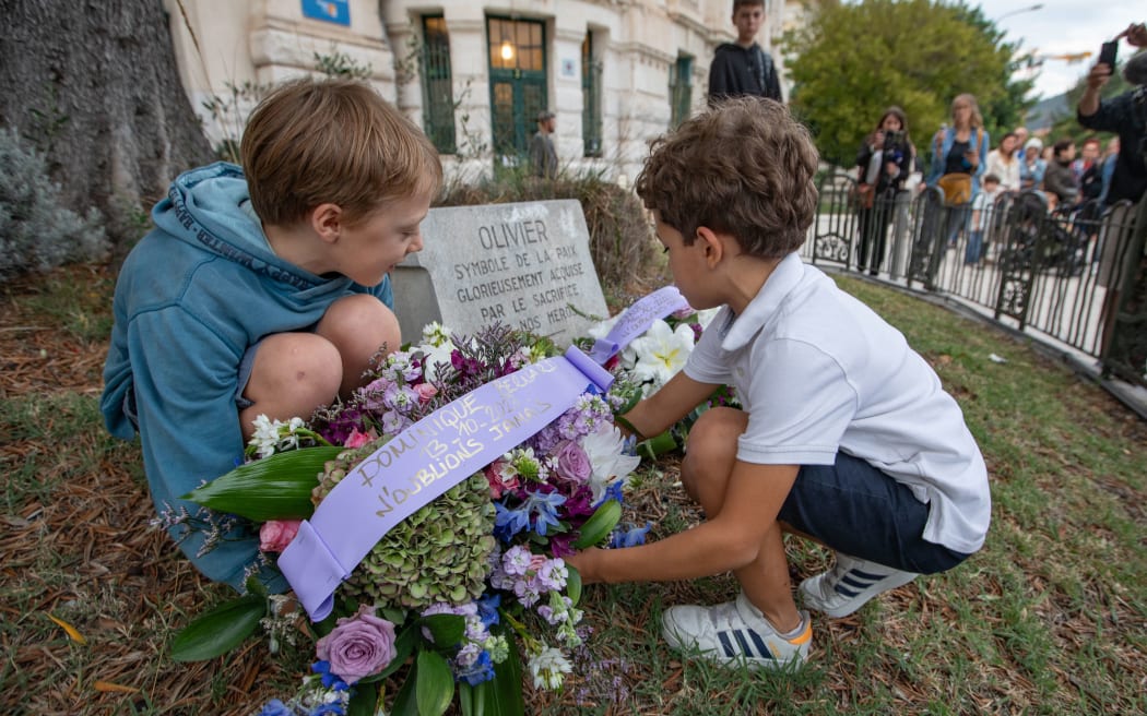 France, Nice, 2023-10-16. Teachers gathered at Place Garibaldi in Nice on Monday 16 October to pay tribute to Dominique Bernard, a teacher in Arras who was stabbed to death on Friday 13 October, and to Samuel Paty, a teacher who was beheaded in Conflans-Sainte-Honorine three years ago. They then marched to the Lycee Massena to lay flowers. A minute s silence was also observed. Photograph by Roland MACRI / Hans Lucas.
France, Nice, 2023-10-16. Les enseignants se sont rassembles place Garibaldi a Nice ce lundi 16 octobre, en hommage a Dominique Bernard, professeur a Arras et tue au couteau vendredi 13 octobre, et a Samuel Paty, professeur decapite a Conflans-Sainte-Honorine il y a trois ans. Ils ont marche ensuite jusqu au lycee Massena deposer des fleurs. Une minute de silence a egalement ete respectee. . Photographie de Roland MACRI / Hans Lucas. (Photo by Roland Macri / Hans Lucas / Hans Lucas via AFP)