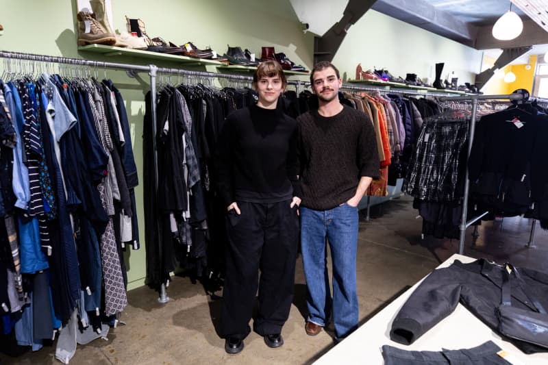 Evan Fraser (right) is the manager of Recycle Boutique. His sister Katelyn, dressed head to toe in black.