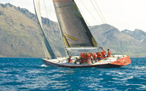 Former America's Cup yacht NZL14 sailing on Lake Wakatipu.