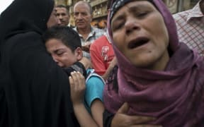 Some relatives collapsed outside the courtroom in Egypt's southern province of Minya.