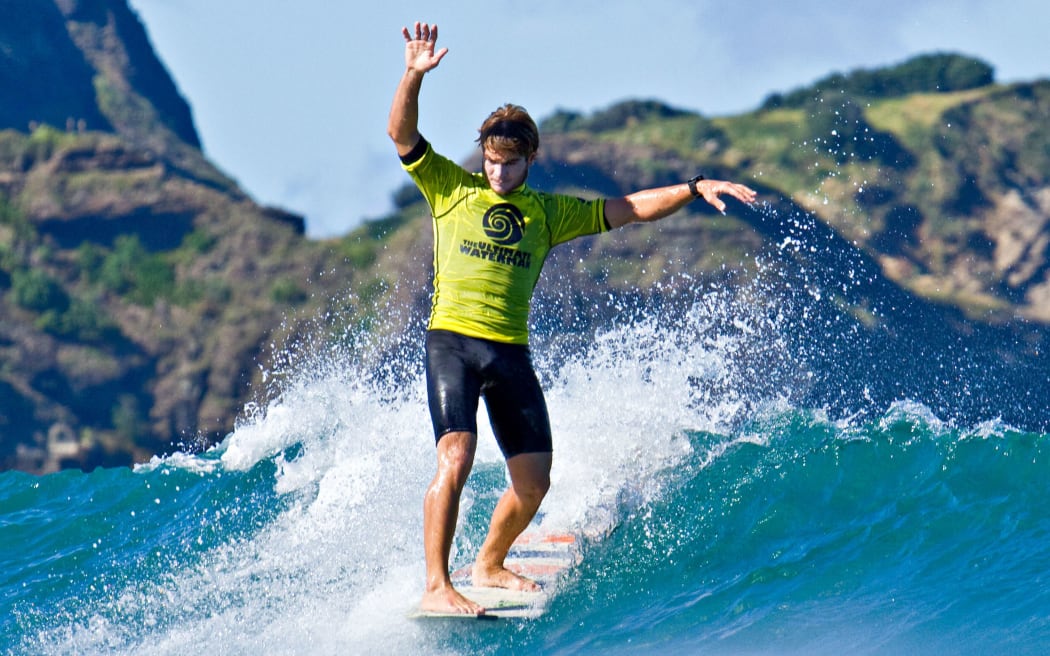 Zane Schweitzer rides the longboard