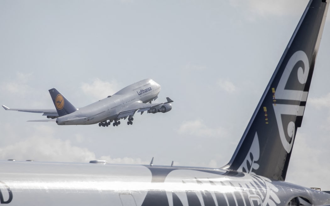 A Lufthansa aircraft repatriating German tourists takes off headed to Frankfurt from Christchurch Airport in Christchurch on April 8, 2020.