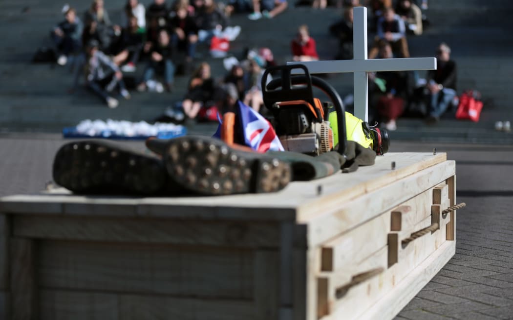 Families and colleagues of forestry workers killed at work marched to Parliament in April and placed a coffin in the grounds.