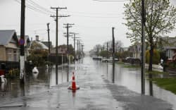 Scenes on Surrey Street, South Dunedin, Friday evening.