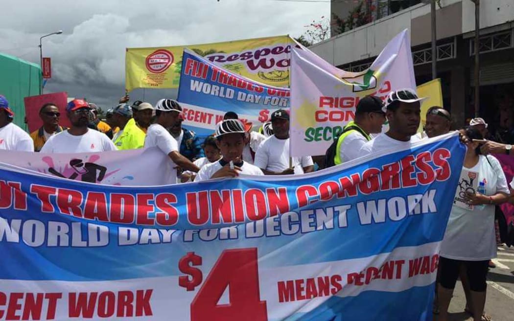Workers marching for labour rights in Suva