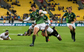 South Africa’s Ruhan Nel on his way to a try in the Wellington Sevens final against Fiji.