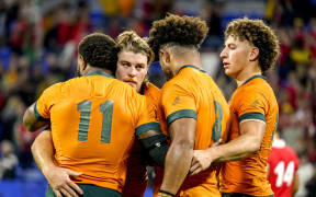 Wallabies players dejected after losing to Wales at the Rugby World Cup.