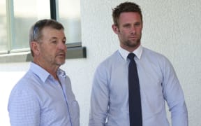 Dave Armstrong (left) and Scott Lee, the hunter he rescued, outside court today.