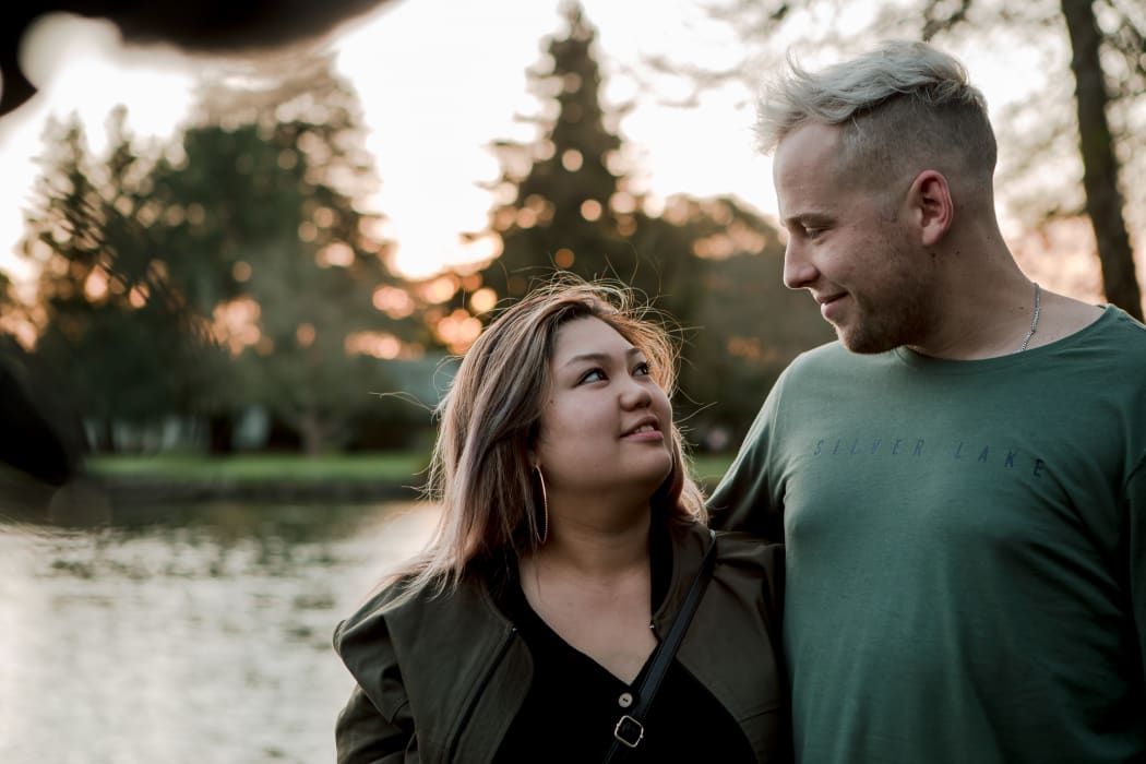Donally and her husband Austin Tweed stand where they met in Waikato University