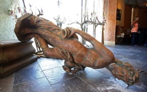 A fallen statue of Bacchus, a Roman god of wine, inside the Ceja Vineyards tasting room.