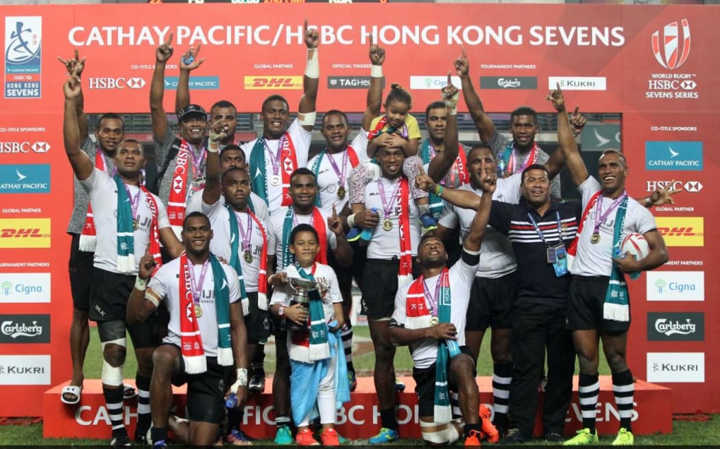 The Fiji team celebrate a third consecutive Hong Kong title