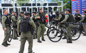MILWAUKEE, WISCONSIN - JULY 14: Law Enforcement Officers from Palm Beach hang out in the Fiserv Forum Plaza ahead of the 2024 Republican National Convention (RNC) on July 14, 2024 in Milwaukee, Wisconsin. Law enforcement officials began final preparations on the eve of RNC where Republican presidential candidate former President Donald Trump is expected to formally receive the GOP nomination for the 2024 U.S. Presidential election. Trump suffered minor injuries during a campaign rally on on July 13 in Butler, Pennsylvania after a gunman opened fired killing one person and injuring two critically.   Michael M. Santiago/Getty Images/AFP (Photo by Michael M. Santiago / GETTY IMAGES NORTH AMERICA / Getty Images via AFP)