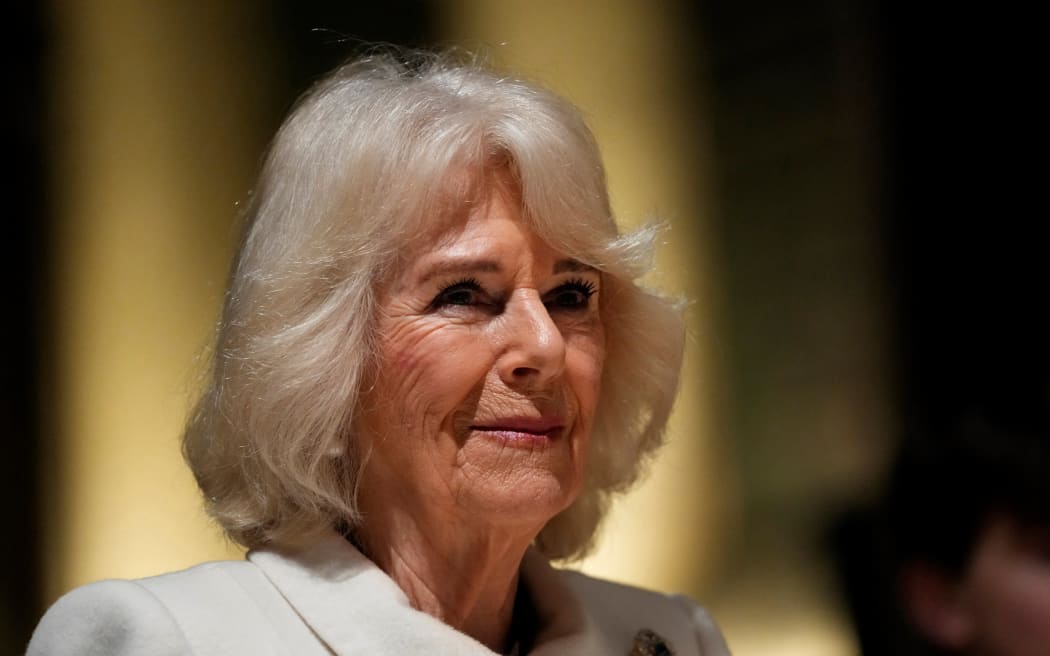 Britain's Queen Camilla reacts as she attends a Musical Evening at Salisbury Cathedral, in Salisbury, England, on February 8, 2024, to celebrate the work of local charities. (Photo by Kirsty Wigglesworth / POOL / AFP)