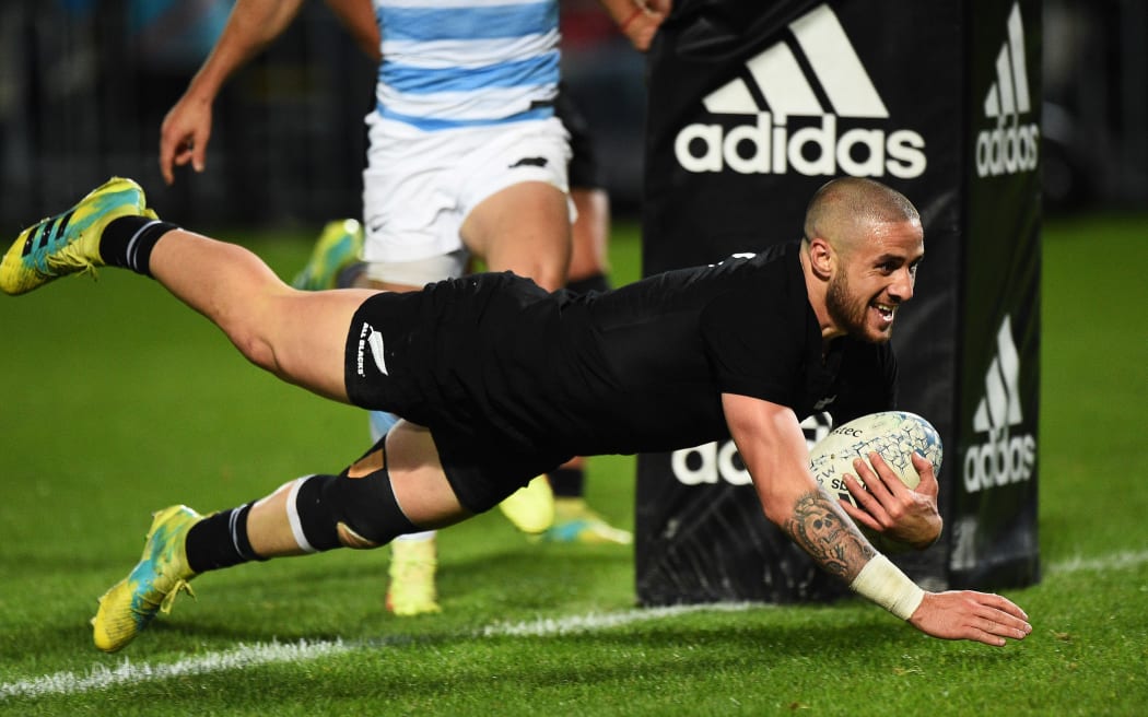 All Black TJ Perenara scores a try during their Rugby Championship test match against Argentina
