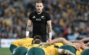 All Blacks TJ Perenara keeps an eye on the scrum during a test against Australia in 2017.