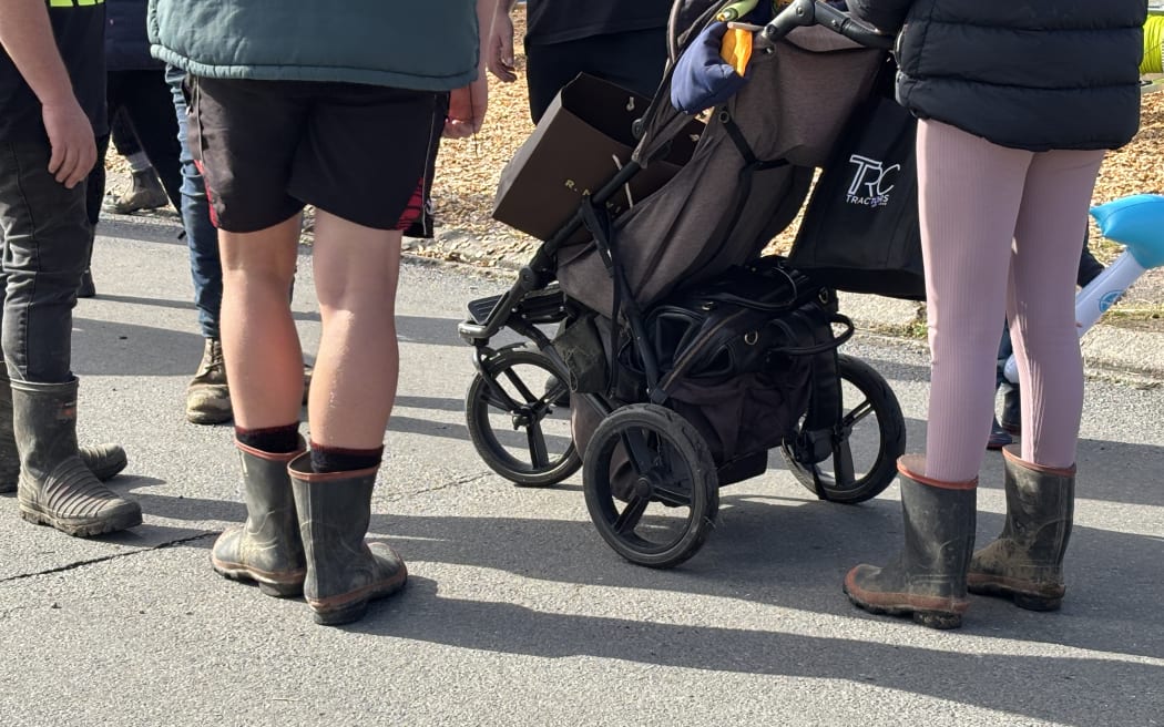 Family wearing gumboots