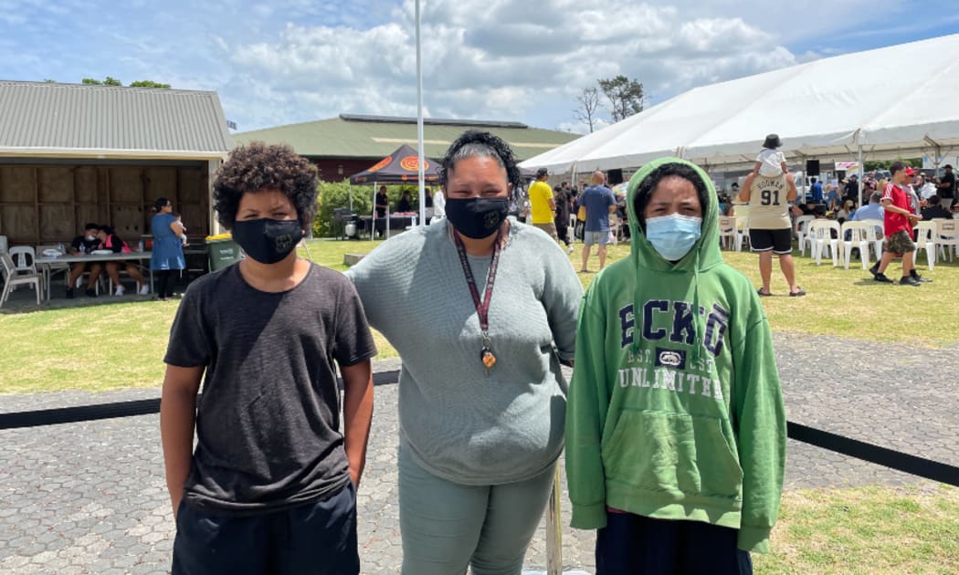 Valetine Hala with sons Hesi and Bernard at Manurewa marae vaccination event on Sunday 23 January 2022.
