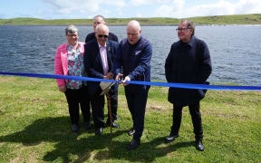 Cutting the ribbon for the new reservoir are, from left, Te Tai Tokerau Water trustee Kathryn de Bruin, Regional Development Minister Shane Jones, trustee Dover Samuels, Prime Minister Christopher Luxon and trust chairman Murray McCully.