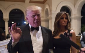US President-elect Donald Trump answers questions from reporters on 31 December at Mar-a-Lago in Palm Beach, Florida.