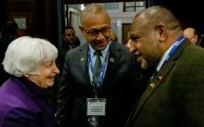 PNG PM James Marape, right, and PNG Treasurer Ian Ling Stuckey, centre, meet United States Secretary of Treasury Janet Yellen.