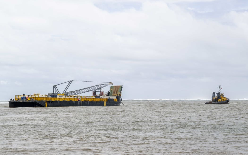 Barge as it was leaving the port of Apia for the South West coast of Samoa where the Manawanui sunk.