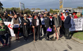 Hundreds of people marched to the Manuwatū District Council buildings in Feilding to protest against the council kicking the can down the road on Māori representation.