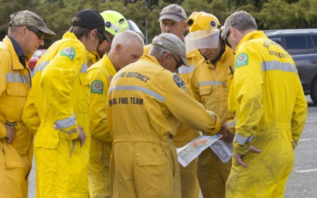 Fire crews planning their next move.