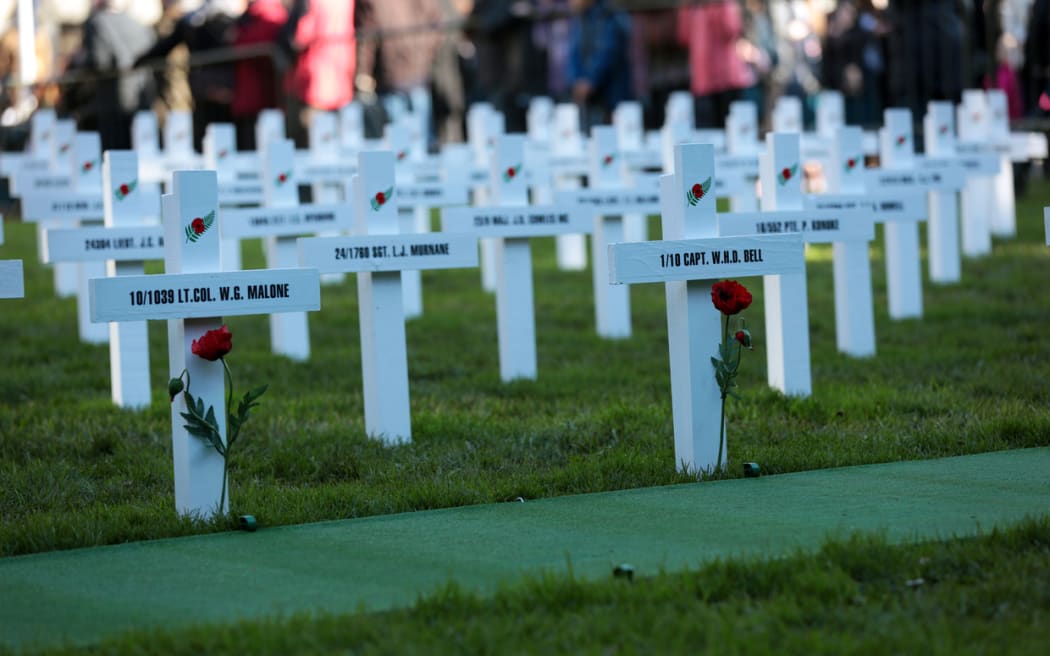 The Field of Remembrance Trust's 100 white crosses on the lawn of Parliament.