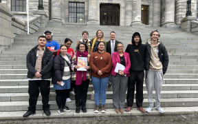 Pillars youth panel Ngā Rangitira Apōpō pictured with Minister for Children Karen Chhour and Chief Children's Commissioner Claire Achmad.