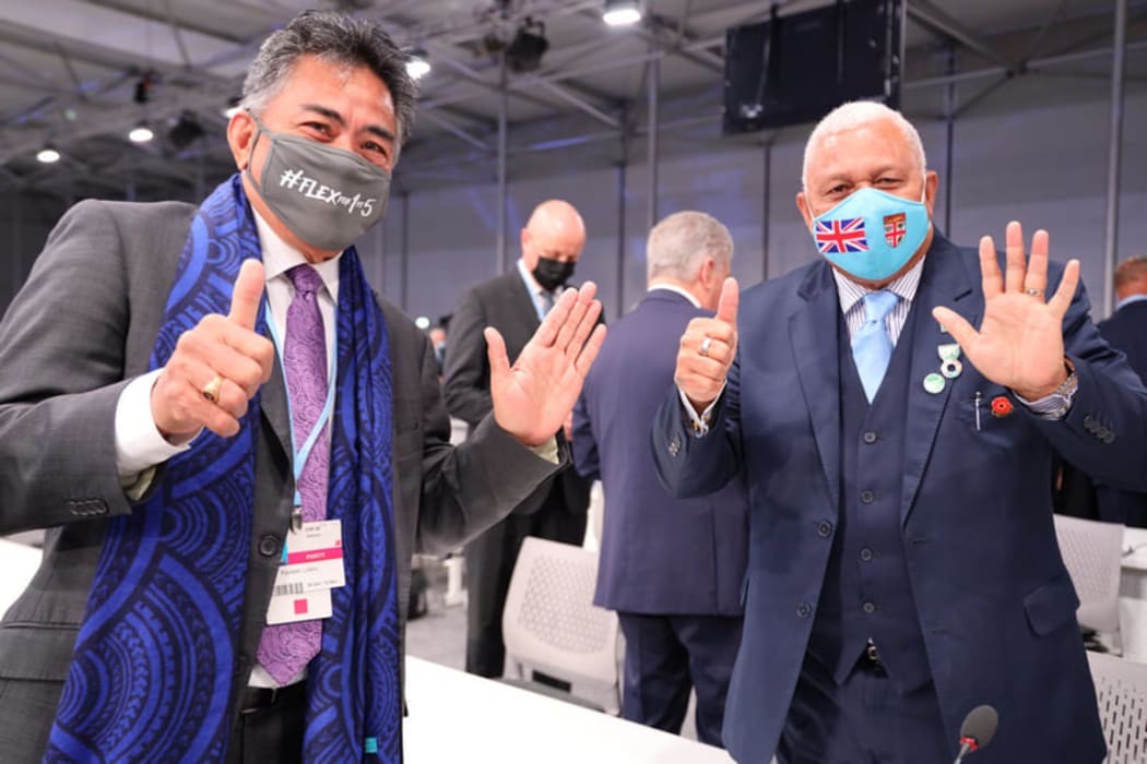 Fijian Prime Minister, Hon Voreque Bainimarama (right) with Samoa’s Permanent Representative to the United Nations, Ambassador Fatumanava Luteru (left) at COP26 in Glasgow