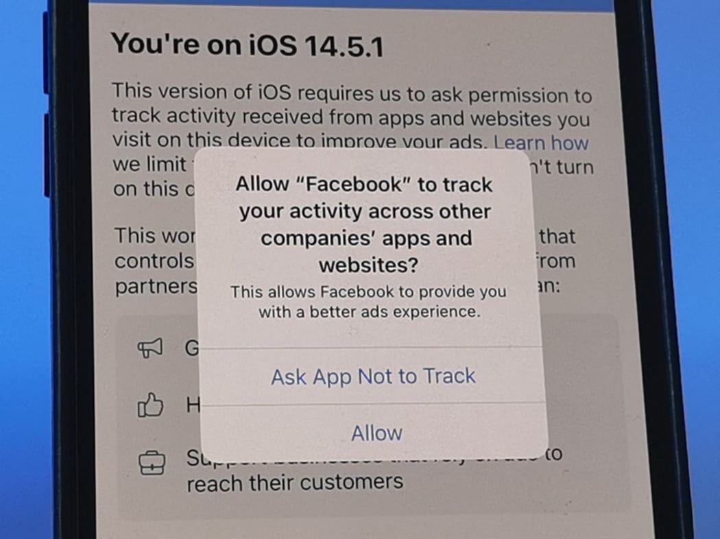 A privacy notice appears on an iPhone 12 under the new iOS 14.5.1 operating system. Developers of an application have to ask for the user's permission to allow cross-app tracking.