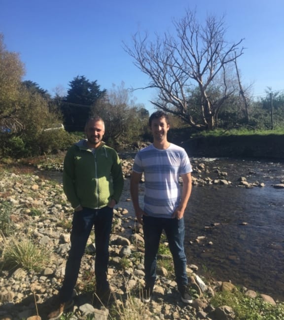 Dr Adam Canning and Dr Richard Winkworth on the banks of the Manawatu River
