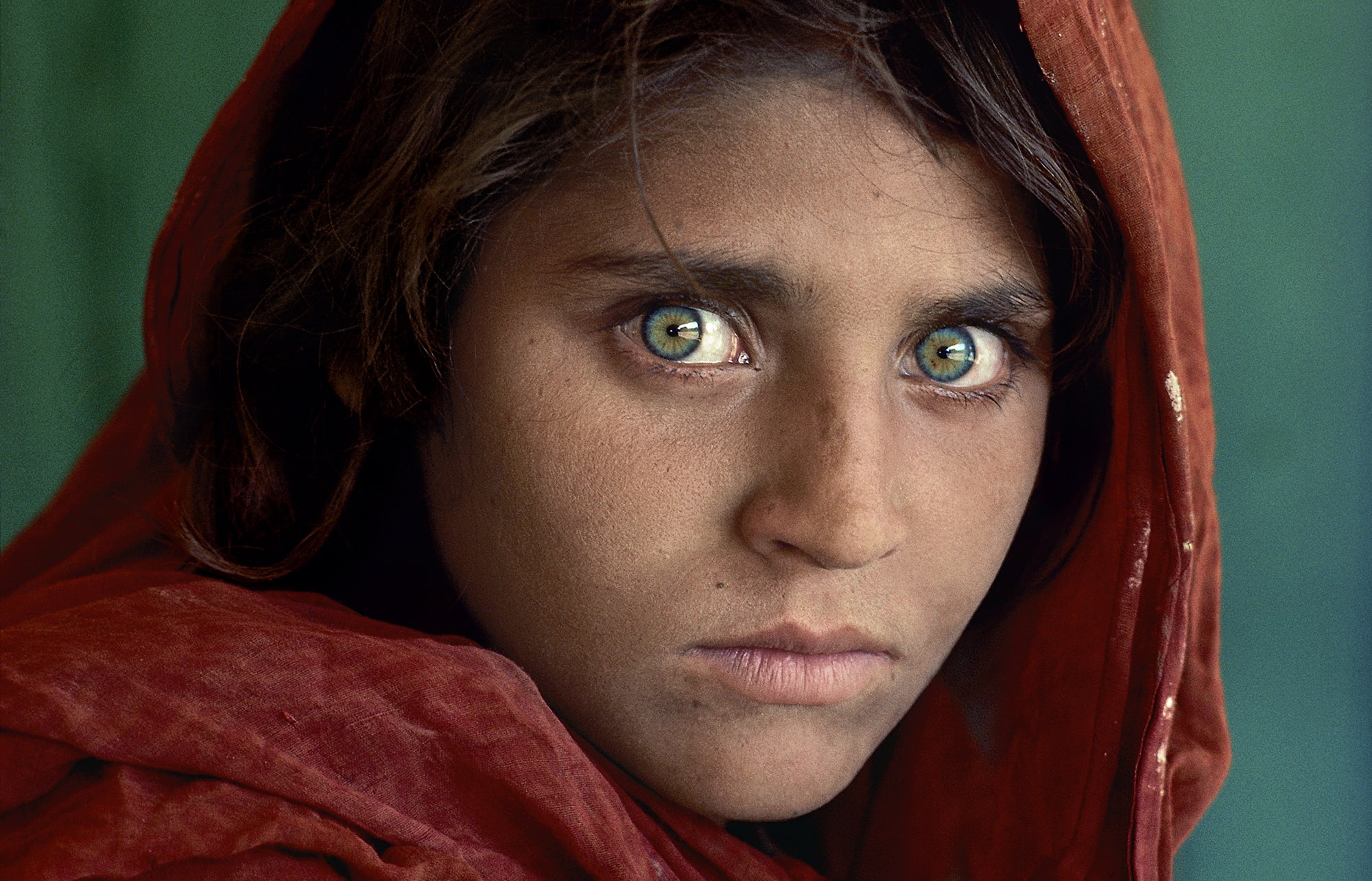 Sharbat Gula, ‘Afghan Girl’, at Nasir Bagh refugee camp near Peshawar, Pakistan, 1984.
