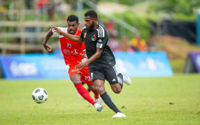 Hekari United’s Joseph Joe (black jersey) in action at the 2023 championship in Port Vila, Vanuatu. He returns with United for the 2024 event in Tahiti. Photo: Kirk Corrie / www.phototek.nz