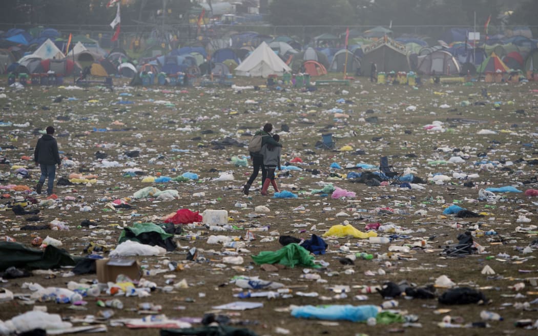 Discarded litter is pictured at the end of the Glastonbury Festival of Music and Performing Arts on Worthy Farm near the village of Pilton in Somerset, south west England, on June 29, 2015.