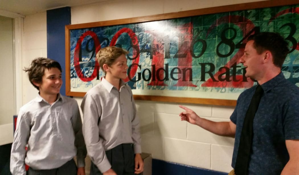Wellington College students Harry, left, and Thomas with teacher Ryan Gilbertson.