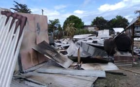 Destroyed houses in Buka.