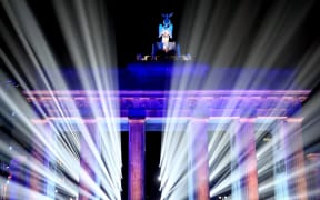 A light show at the Brandenburg Gate as part of celebrations for the 25th anniversary of the fall of the Berlin Wall.