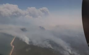 Emergency services say the fire is 50 kilometres in length.