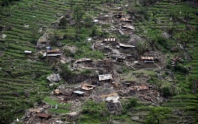 Damaged houses can be seen from an Indian Army helicopter in Gorkha, Nepal.