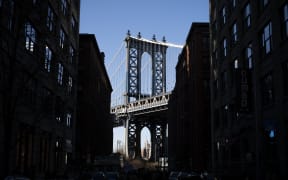 United States, New York, NY, 2024-03-24. The Manhattan Bridge from a street in the Brooklyn district of New York City. Photograph by Norbert Grisay / Hans Lucas.
United States, New York, NY, 2024-03-24. Le pont de Manhattan depuis une rue du quartier de Brooklyn dans ville de New York City. Photographie de Norbert Grisay / Hans Lucas. (Photo by Norbert Grisay / Hans Lucas / Hans Lucas via AFP)