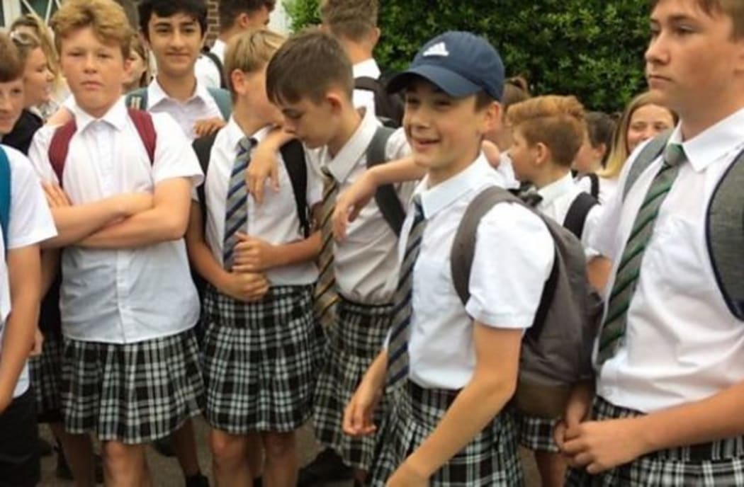 Boyes from ISCA Academy in Exeter wore skirts in protest at being told they were not allowed to wear shorts.