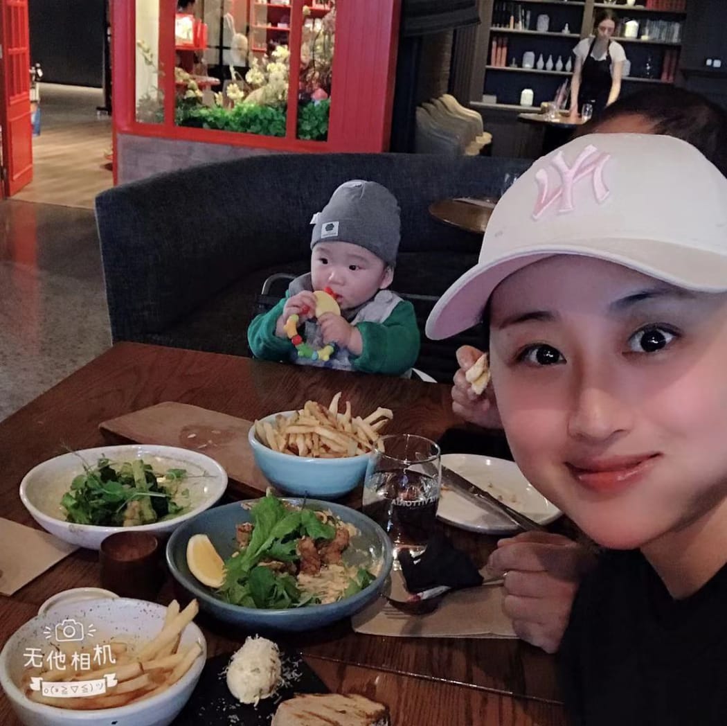 Victoria Chen and her son Bryan, 1.