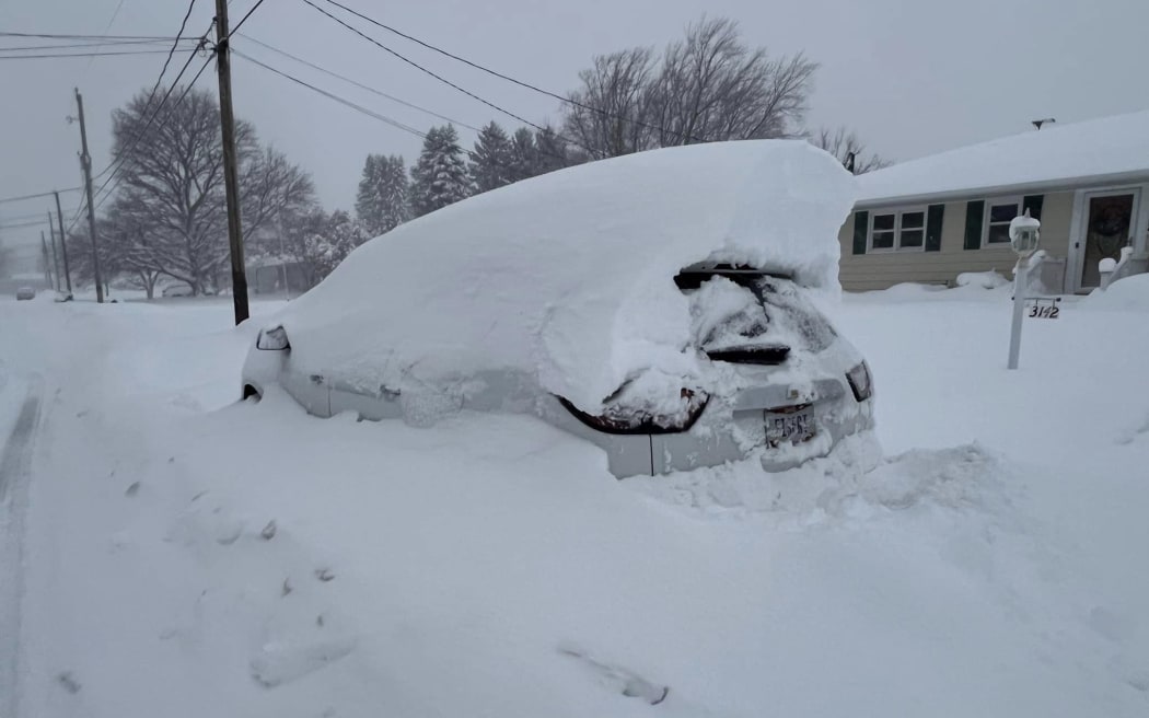 Lake-effect snow buried a vehicle in Pennsylvania's Millcreek Township.