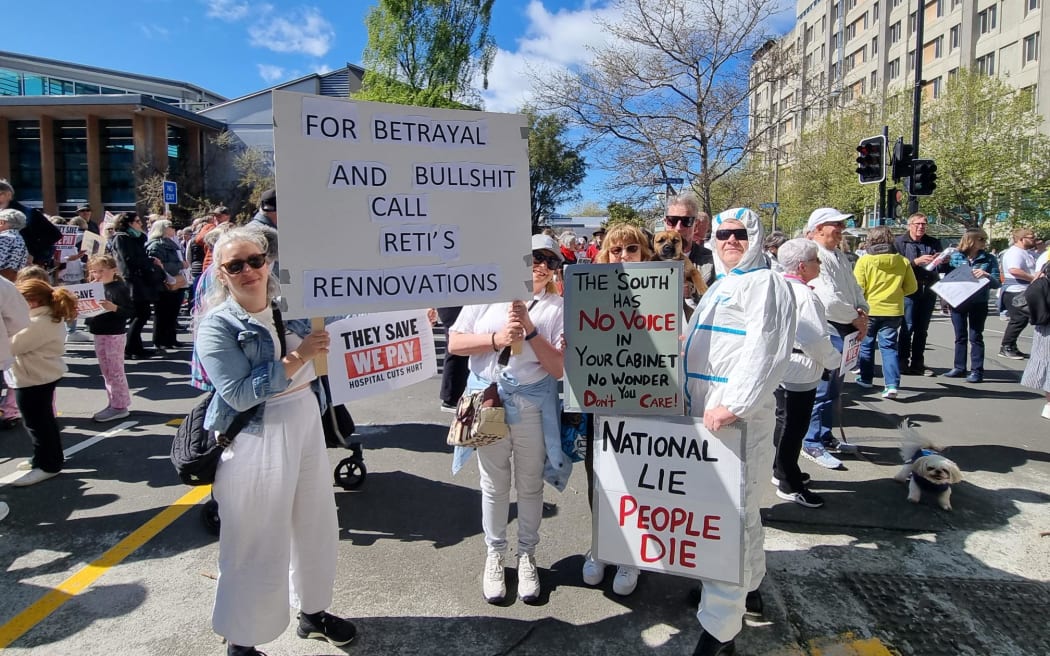 Protesters against changes to the Dunedin Hospital rebuild project gather ahead of a march in Dunedin on 28 September 2024.