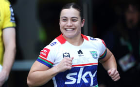 Tysha Ikenasio runs out on the field for the NZ Warriors Women.