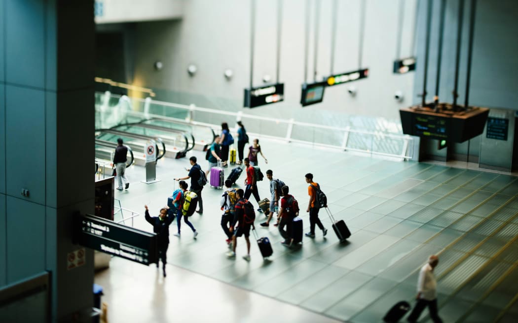 Group of people inside airport