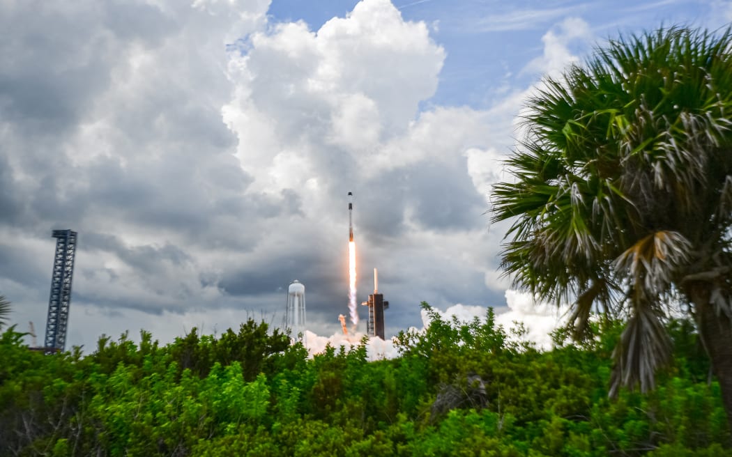 A SpaceX Falcon 9 rocket with the Crew Dragon capsule Endeavour carrying the Crew-11 mission lifts off from Launch Complex 39A at NASA’s Kennedy Space Center in Florida on August 1, 2025. NASA and SpaceX launched a four-member crew to the International Space Station (ISS) on Friday for the latest research expedition to the orbiting laboratory. American astronauts Zena Cardman and Mike Fincke, Japan's Kimiya Yui, and Roscosmos cosmonaut Oleg Platonov lifted off at 11:43 am aboard a SpaceX Crew Dragon capsule mounted on a Falcon 9 rocket from Kennedy Space Center in Florida. (Photo by CHANDAN KHANNA / AFP)