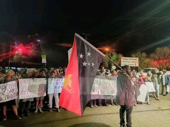 Students from the University of Goroka stage an early morning protest against the signing of a PNG-US Bilateral Defense Cooperation Agreement. 22 May 2023