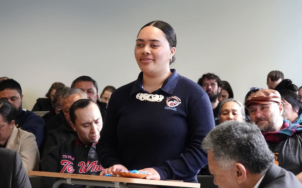 Seventeen-year-old Tamarah Waiomio-Ashby, a year 13 student at Te Rangi Aniwaniwa, urges councillors to retain Māori wards. Photo: Peter de Graaf / RNZ